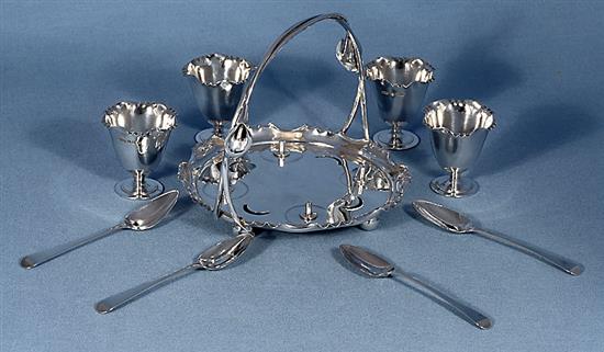 A Victorian silver egg cruet set with four egg cups,